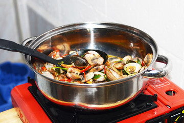 fried  sea shell with sweet basil and curry