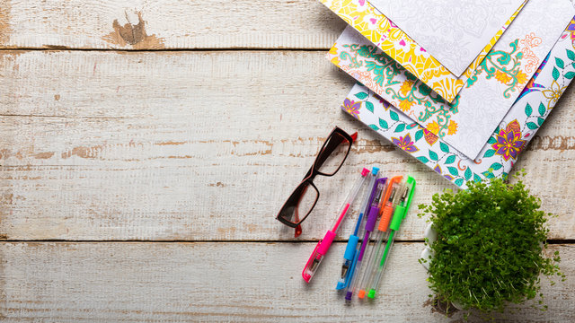 Adult coloring books, stress relieving trend, mindfulness concept