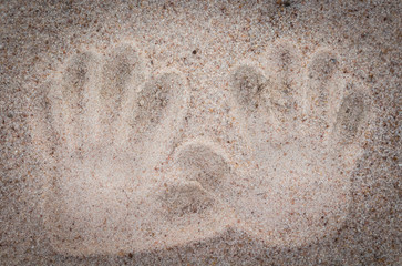 Handprint in the sand
