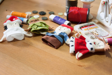 Handmade Christmas doll finger for Christmas gift on wood backgr