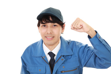 ガッツポーズの労働者