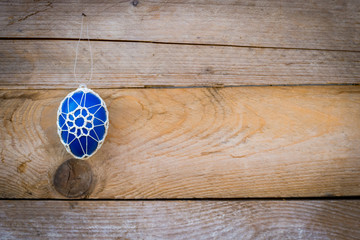Colorful Easter eggs on wooden background