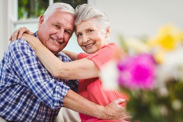 Senior couple embracing each other