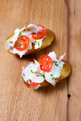 the bruschetta juicy tomatoes on fresh bread