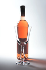 Rose wine and wine glass, studio isolated