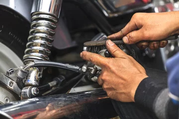 Fotobehang Motorcycle mechanic © Naypong Studio