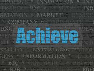 Business concept: Achieve on wall background