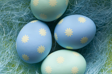 Four Easter eggs in the nest