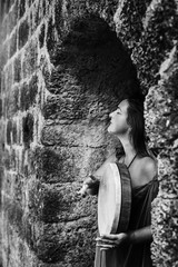 portrait of a woman with a tambourine