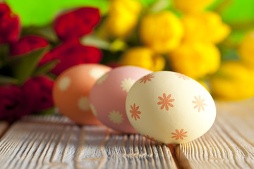 Easter eggs on colorful spring background