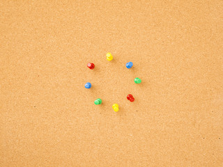 Pins in circle on notice board