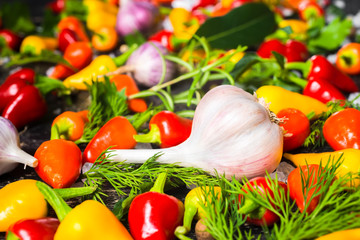 setting of garlic, yellow, red hot chili peppers, sea salt, diff