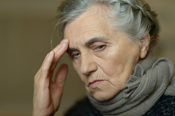 Fototapeta premium Sad aged woman