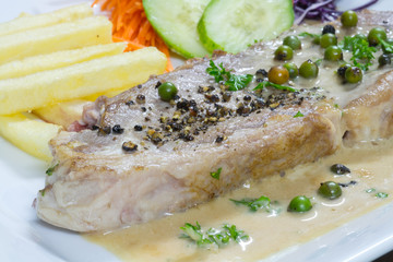 Pork steak with pepper sauce