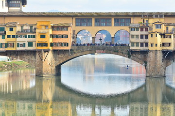Fototapeta na wymiar The most famous bridge in Florence, Ponte Vecchio; the medieval time in Italy.