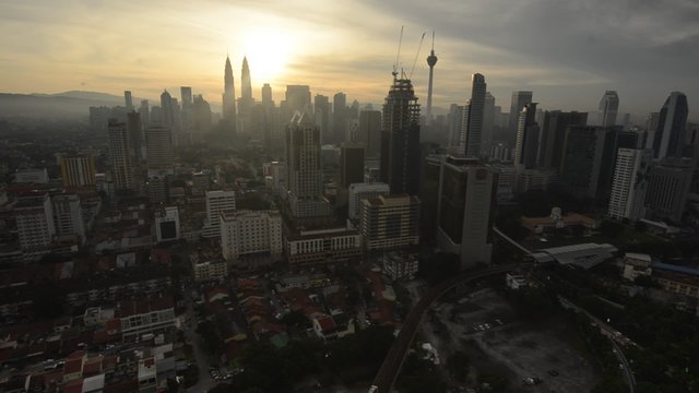 Footage of Kuala Lumpur with clouds background. Kuala Lumpur will have a lot of tropical rain between october to january every year
