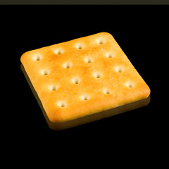 Isolated image of delicious cookies on a black background close up