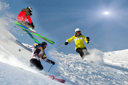 Skicollage, drei Skifahrer