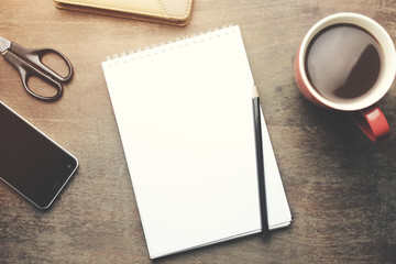 working table on different office accessories