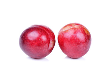  red plum isolated on white background