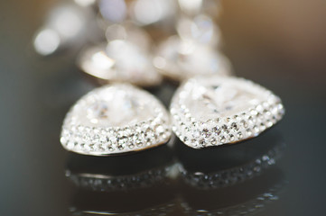 Closeup of Earrings with Gems