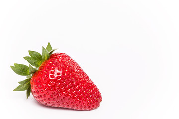 Red strawberry isolated on white.