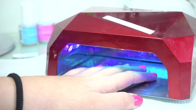 Hand in LED Nail Lamp