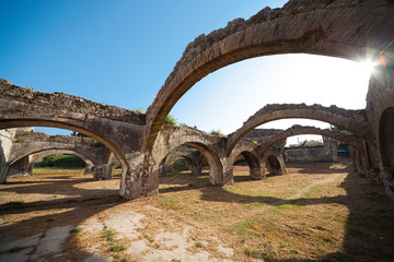 Fototapeta na wymiar The arches of the the Corfu Venetian arsenal in Gouvia