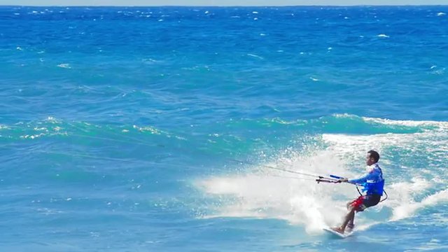 Freedom and fun of kitesurfing. Extreme summer watersports background