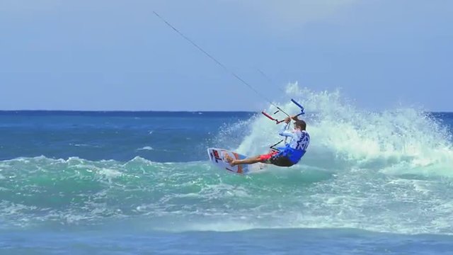Amazing skills of professional kite surfer. Extreme water sport video background