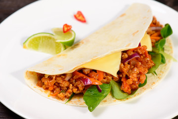 Tacos on a white plate