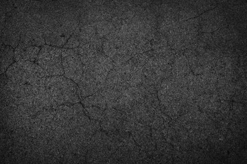 background texture of rough asphalt crack