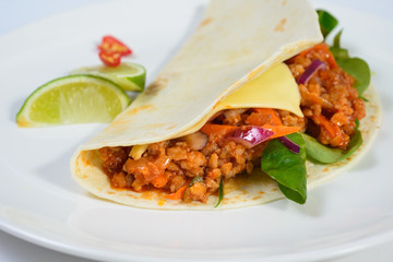 Tacos on a white plate