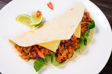 Tacos on a white plate