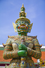 Fototapeta na wymiar Door Keeper at Emerald Buddha Temple, Bangkok Grand Palace, Thai