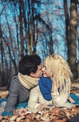 Fototapeta premium Lovers romantic couple in the picnic in the park near water