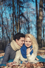 Fototapeta premium Lovers romantic couple in the picnic in the park near water