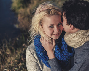 Fototapeta premium Lovers romantic couple in the picnic in the park near water