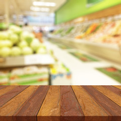 blurred image concrete table and abstract generic supermarket