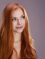Naklejka premium young red-haired girl