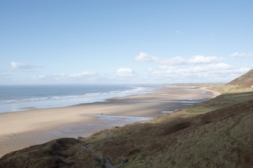Landscape image of Rhossili Bay in the Gower. Taken on a sunny day in winter.