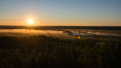Foggy colorful morning above fields
