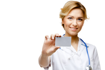 Woman doctor standing on white background