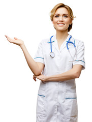 Woman doctor standing on white background