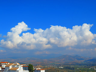 Fototapeta na wymiar Clouds over valley