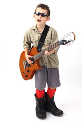 boy playing with a guitar