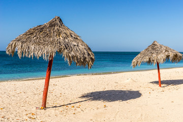 Two Sun Umbrellas at the Beach, Cuba, Caribbean