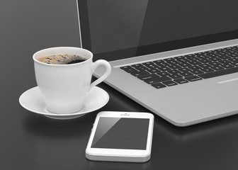 Laptop smartphone and coffee cup