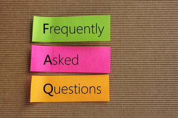 Frequently Asked Questions text on colorful sticky notes