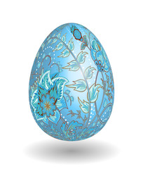 Gold egg with hand draw floral ornate isolated on white background. Fantasy blue gray flowers on blue egg.